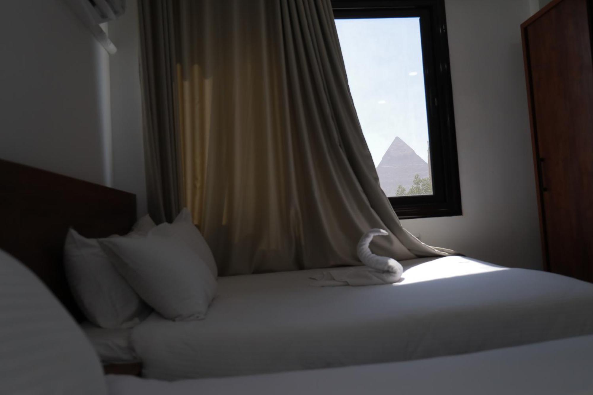 Prince Pyramids Inn Kafret el-Gabal Extérieur photo