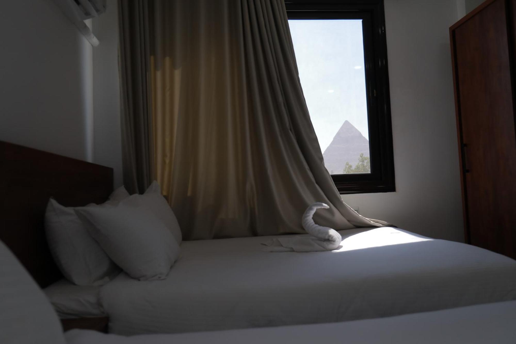 Prince Pyramids Inn Kafret el-Gabal Extérieur photo